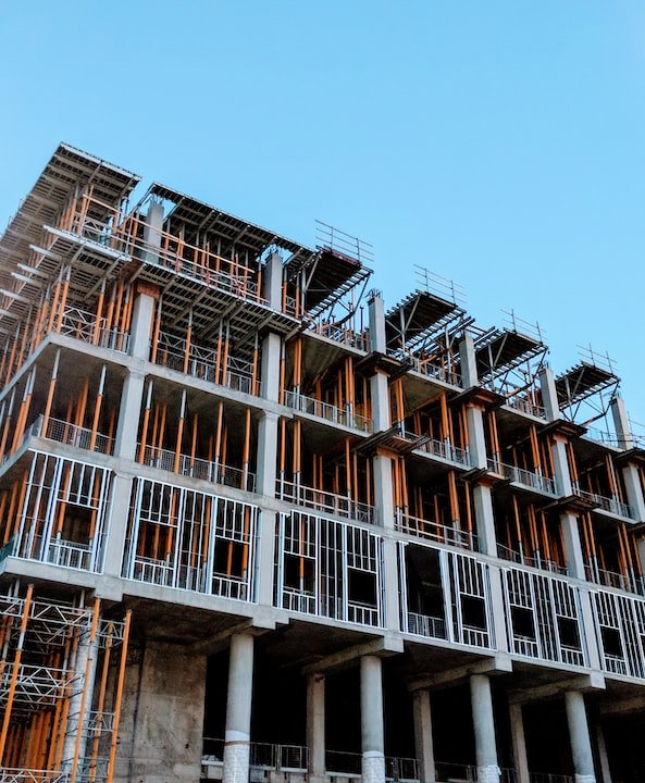 gray concrete building under construction